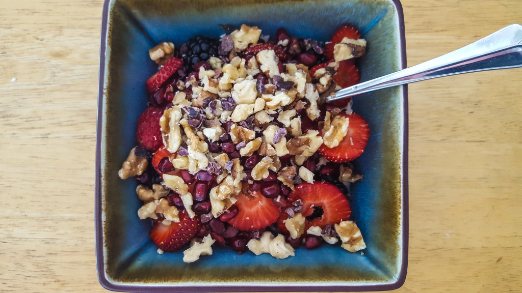 Healthy breakfast, mission complete: yogurt, true cinnamon, fruit, nuts, cocoa nibs.